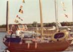 William onboard Monsun with signal flags1974